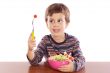 Child eating salad