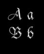 Silver letters A, B