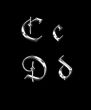 Silver letters C, D