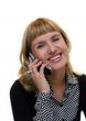 young woman with mobile phone is smiling in office