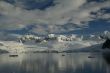Reflections of glacial icefalls and mountains