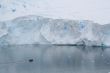 Glacial walls with polar landing boat