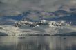 Reflections of glacial icefalls and mountains