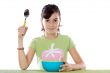 young girl with  blue bowl