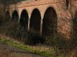 Old abandoned bridge and arches