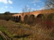 abandoned bridge with arches
