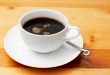 Closeup of black coffee in white cup