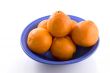 Oranges in blue bowl