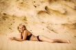 Smiling woman in bikini