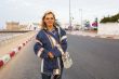 Happy woman on street