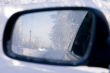 wood reflected in an automobile mirror