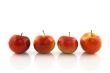 Four red apples in a row