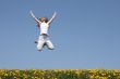 Girl in a jump, looking up