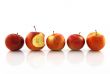 One half-bitten apple among the whole ones
