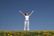 Young woman greets the sun