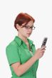 Teen checking her mobile