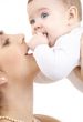 happy mother playing with baby boy