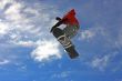 Snowboarder jumping high in the air