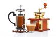 Cup, grinder, coffee pot and beans