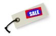 Sale tag against white