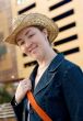 beautiful girl outdoors wearing a hat