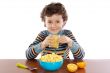 Child eating breakfast
