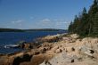 Breaking waves on granite ledges