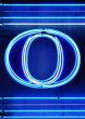 The letter `O` in neon