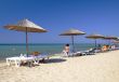 beach with umbrellas