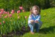 Girl near tulips