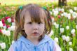 Girl near tulips