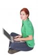 Redheaded girl with a laptop