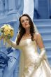 Beautiful bride with bouquet walking