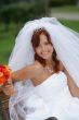 Beautiful smiling bride in white