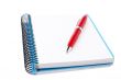 Blank notebook sheet with pen