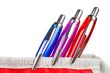 Three pens in a pencil case