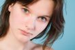 Girl with short hair on a blue background