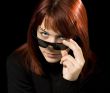 Girl with sunglasses staring at camera