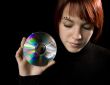 Girl holding a compact disc