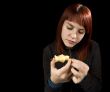 Girl eating apple.