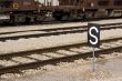 Train station stop with sign