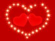 Two 3d red hearts in an environment of stars