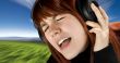 Cute redhead enjoying music