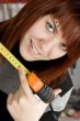 Girl using measuring tape