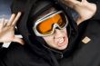Snowboarding boy reacting on accident