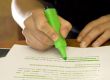 Student using marker to mark important text