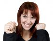 Girl smiling holding keys and expressing her happiness