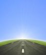 Road leading into the sun