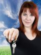 Redhead girl passing keys