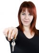 Redhead girl passing keys